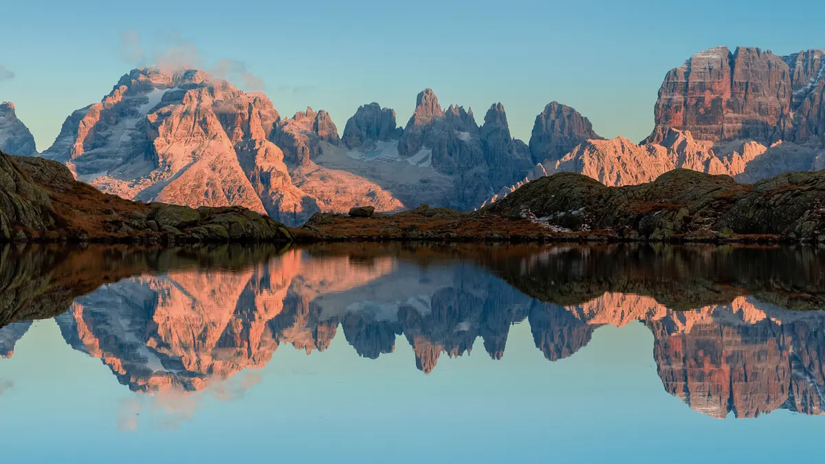 Mountains reflected on a lake near Madonna di Campiglio